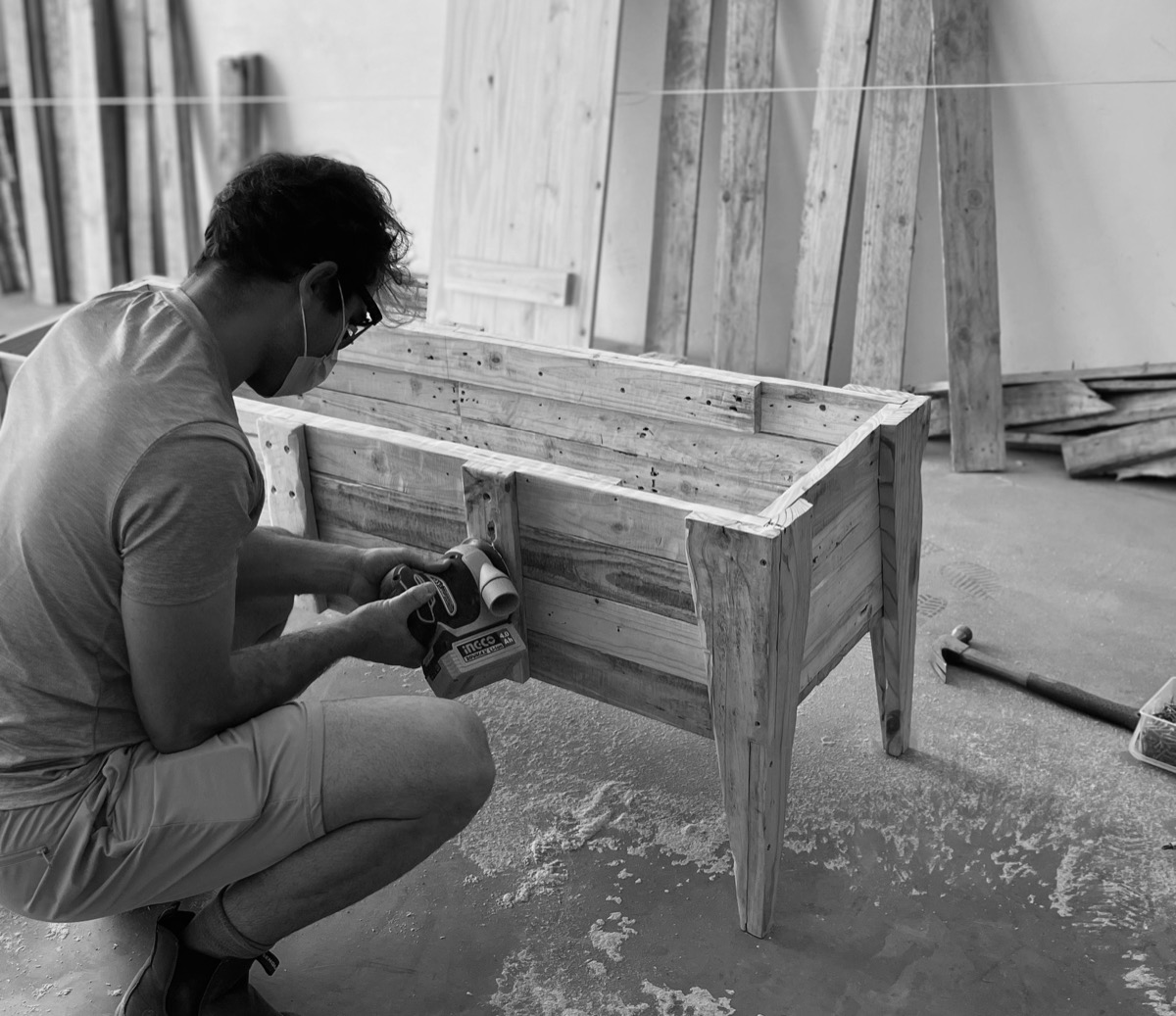 Sanding a timber piece by hand